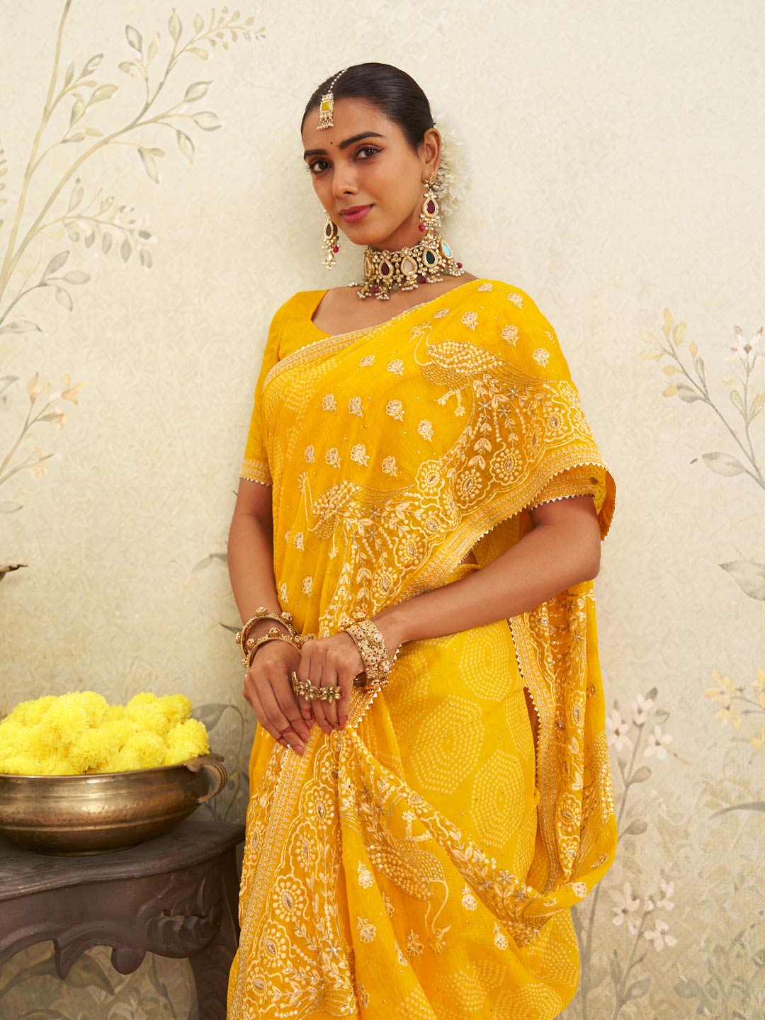 Yellow embroidered chiffon saree wedding wear