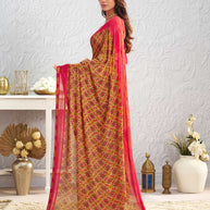 Orange floral printed georgette saree festive wear