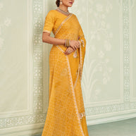 Yellow embroidered chiffon saree wedding wear