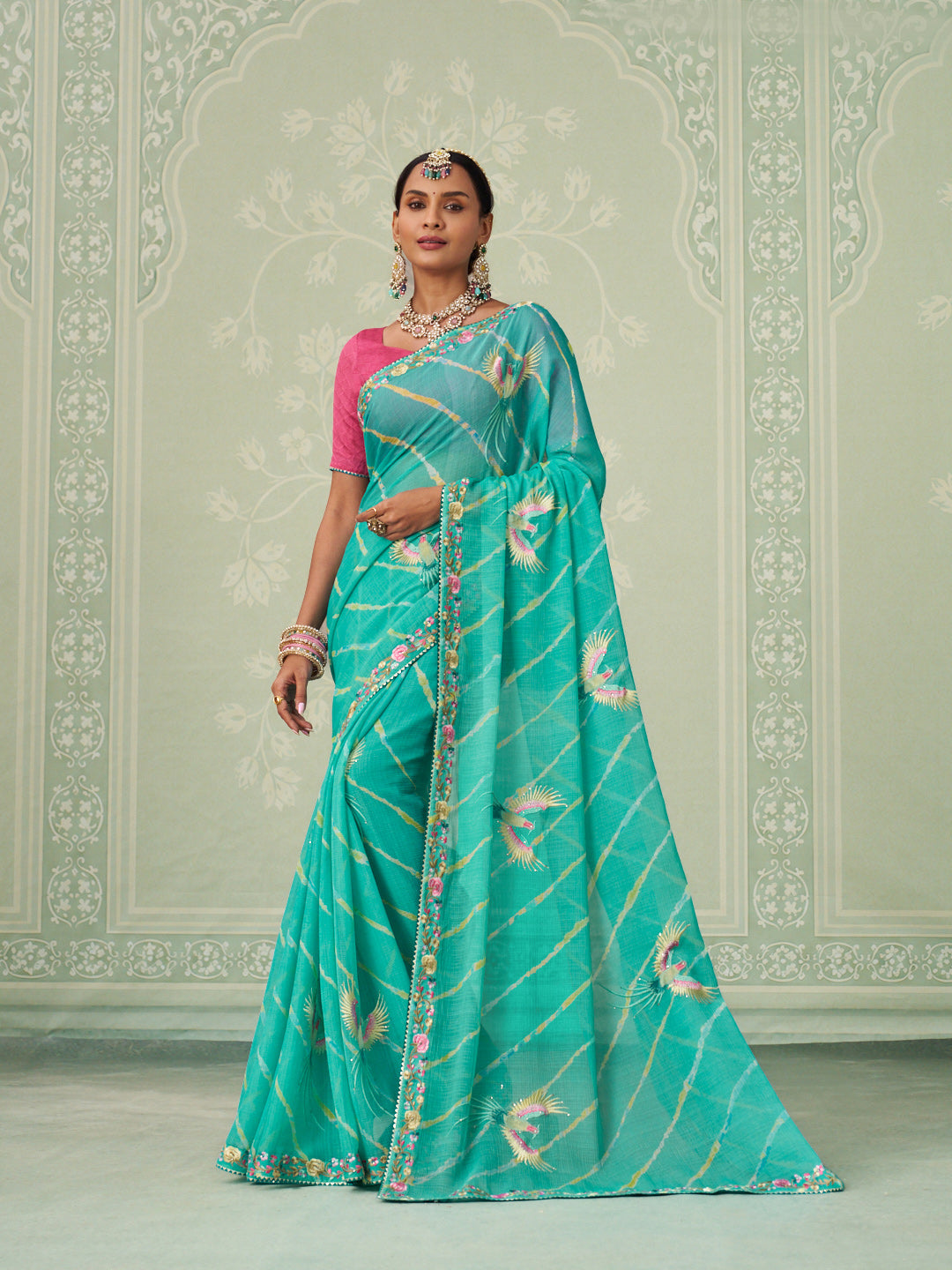 Green embroidered chiffon saree daily wear