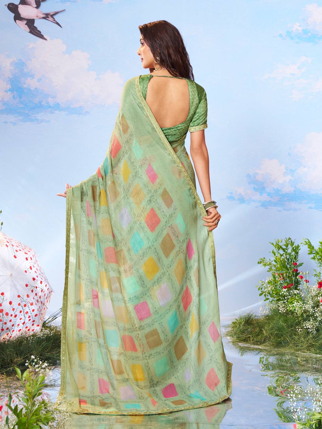 Green embroidered silk saree festive wear