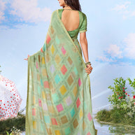 Green embroidered silk saree festive wear