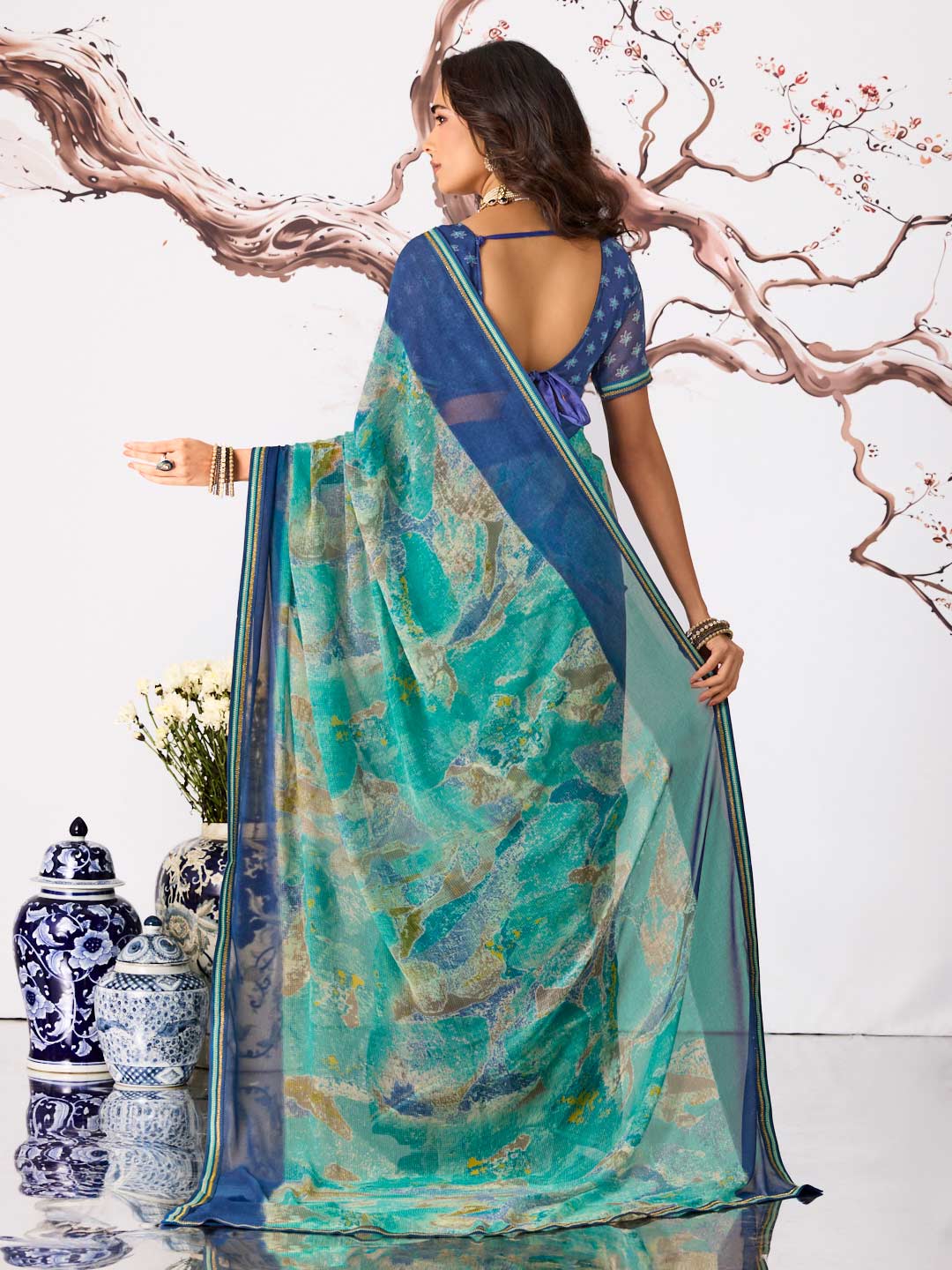 Blue abstract printed georgette saree festive wear