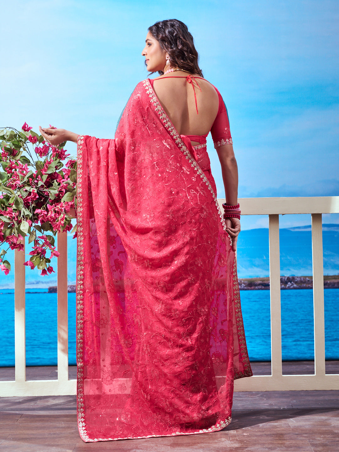 Red embellished embroidered chiffon saree wedding wear