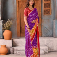 Purple bandhani printed silk blend saree wedding wear