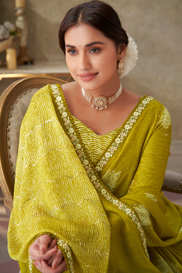 Green embroidered chiffon saree festive wear
