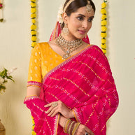 Pink bandhani printed georgette saree wedding wear