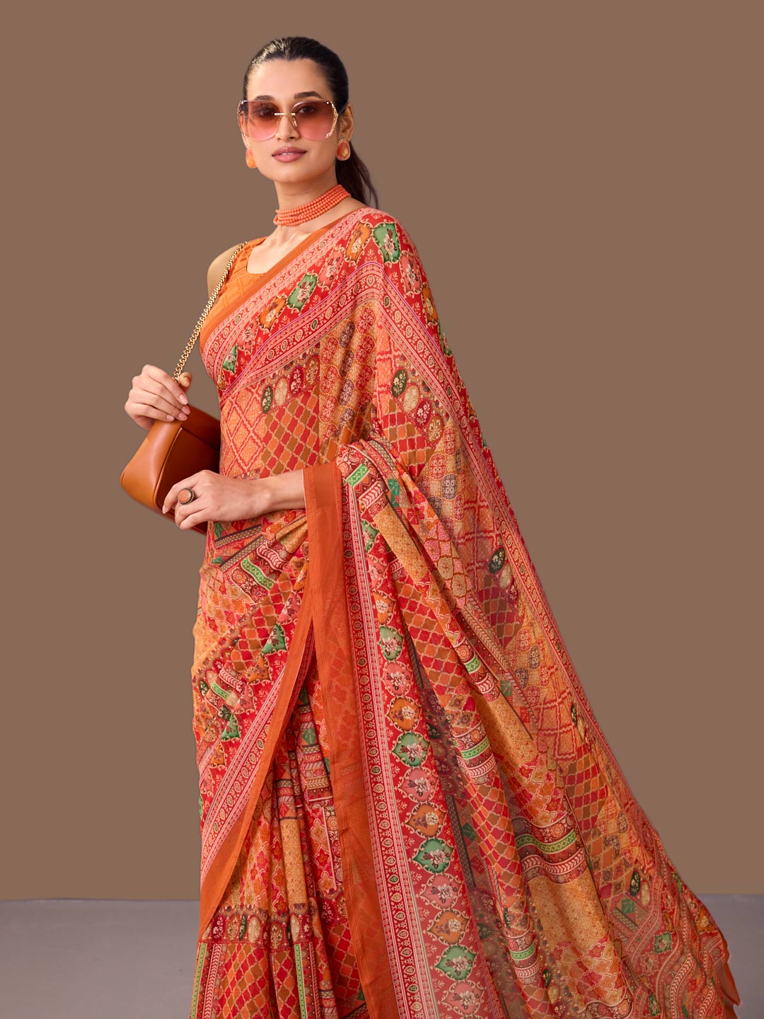 Laxmipati Dillagi Orange Georgette Floral Saree
