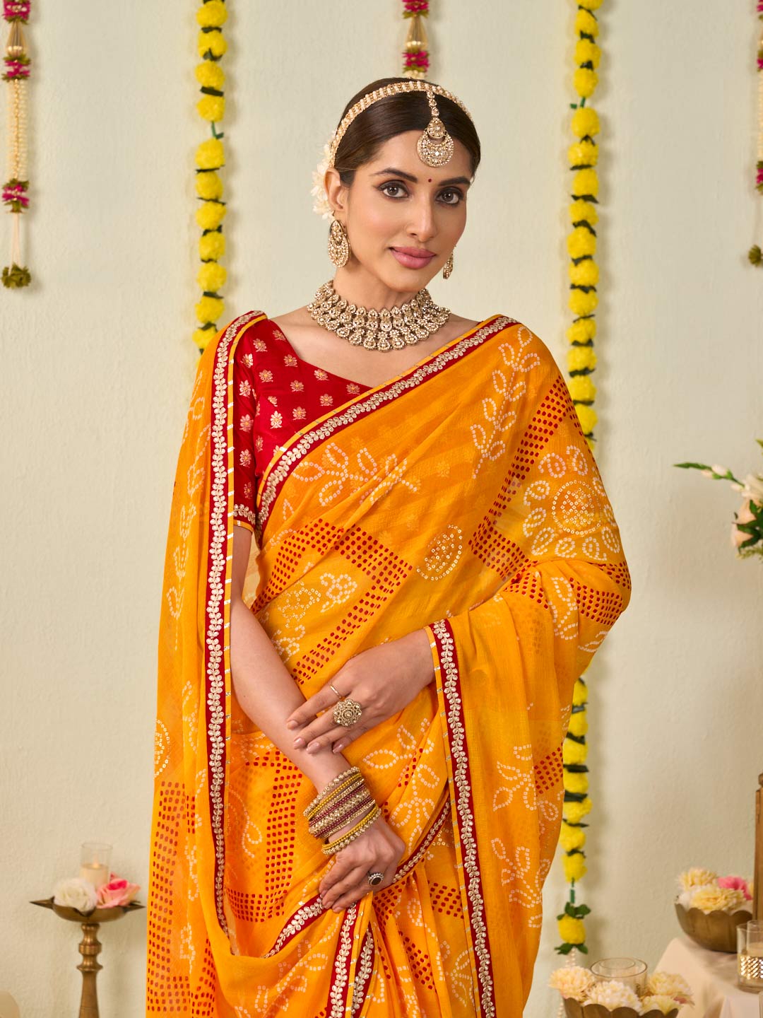 Orange bandhani printed georgette saree casual wear