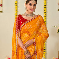 Orange bandhani printed georgette saree casual wear