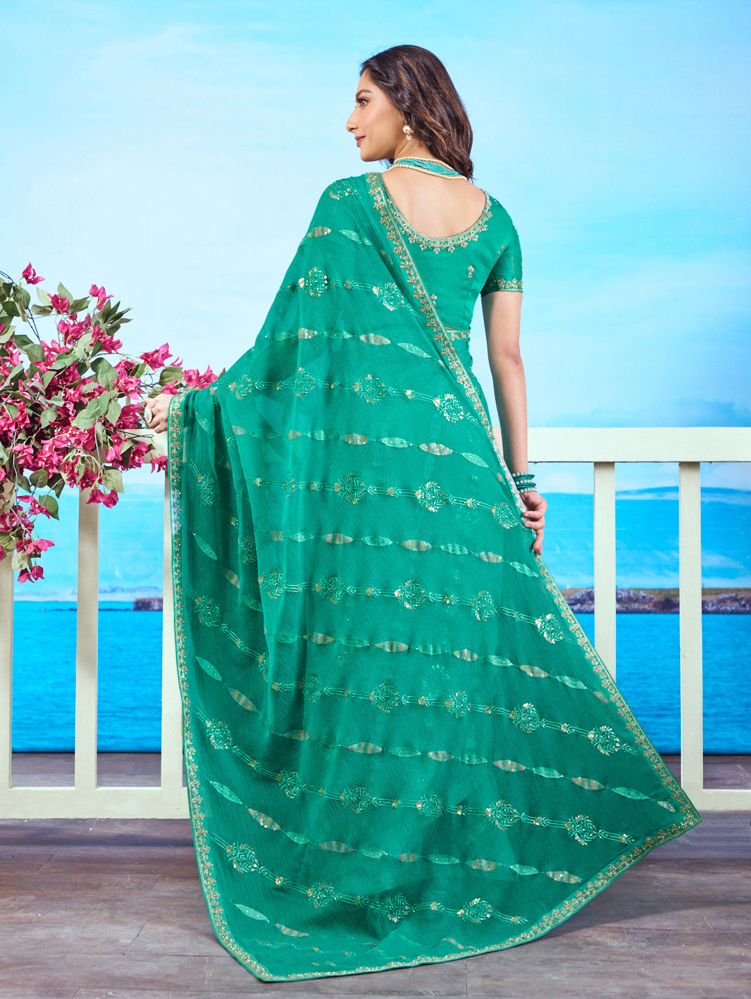 Green gold embroidered chiffon saree elegant wear