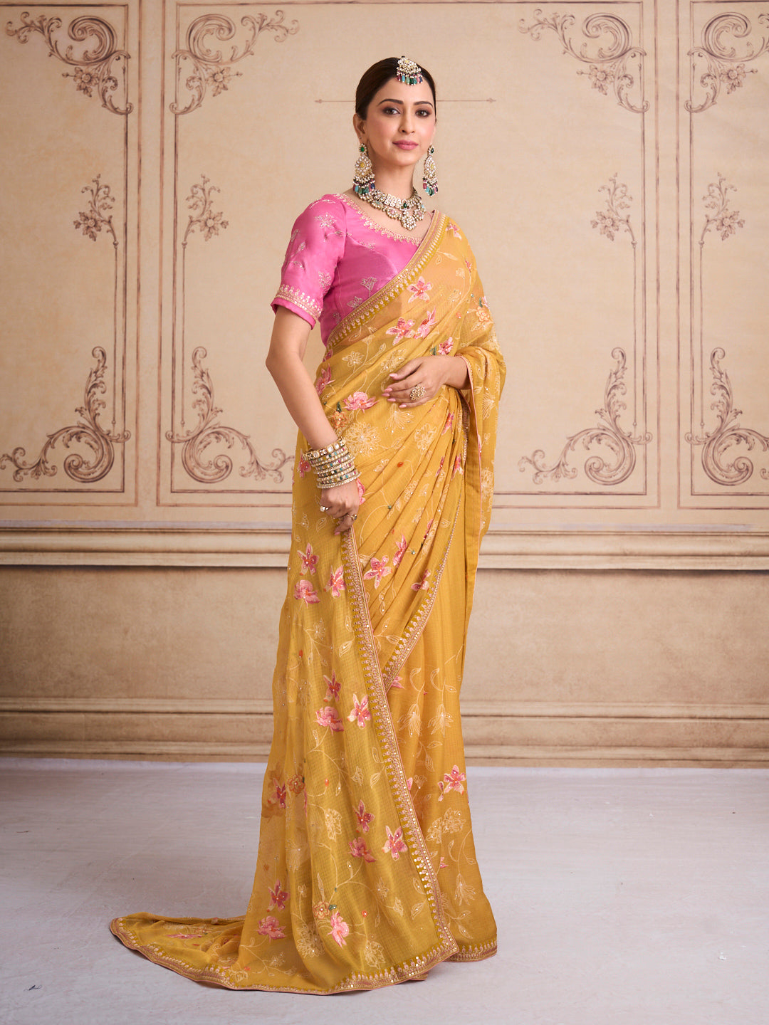 Yellow embroidered tissue organza saree daily wear
