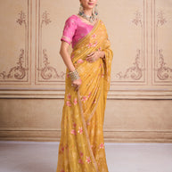 Yellow embroidered tissue organza saree daily wear