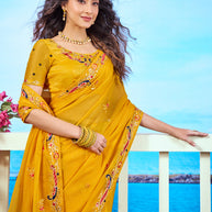Yellow peacock embroidered chiffon saree party wear 
