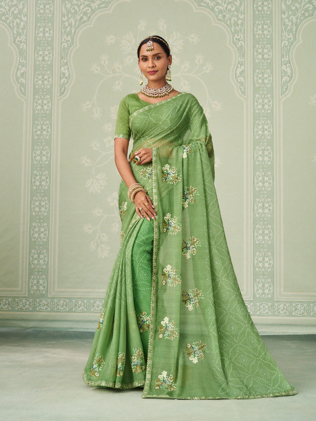 Green floral embroidered chiffon saree festive wear