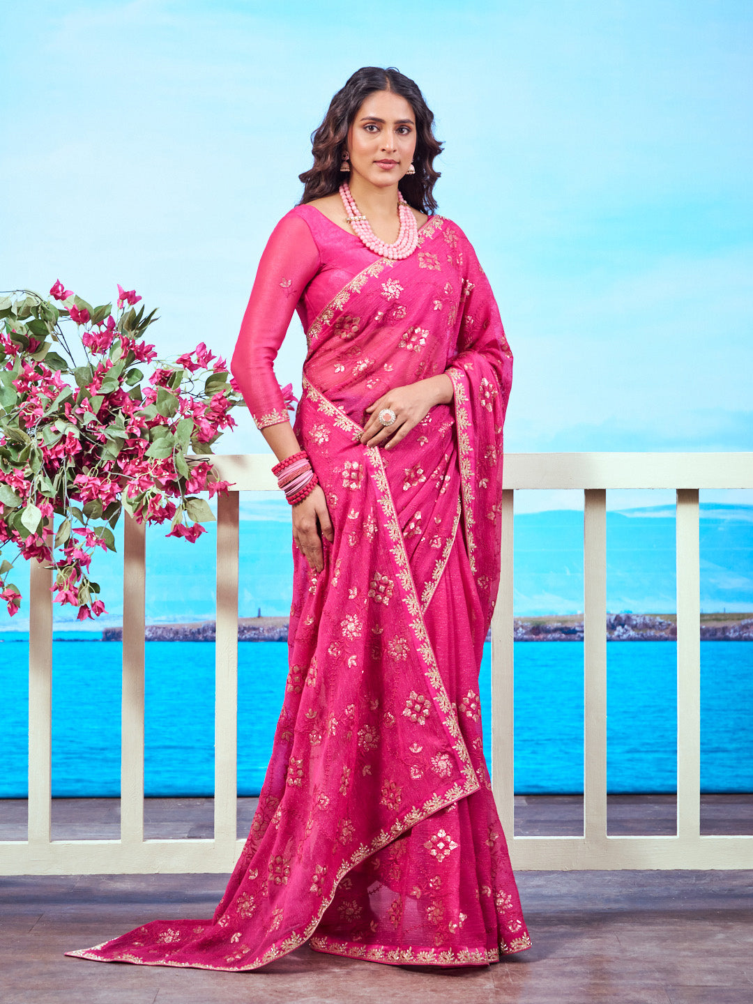 Pink floral embroidered chiffon saree festive wear | Pink gold floral embroidered chiffon saree party wear | Pink floral motif chiffon saree elegant wear | Pink sequin embroidered chiffon saree occasion wear | Pink embroidered border chiffon saree work wear