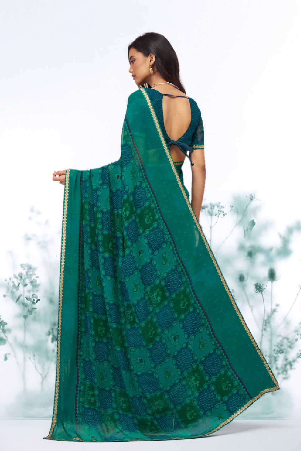 Green floral printed georgette saree festive wear