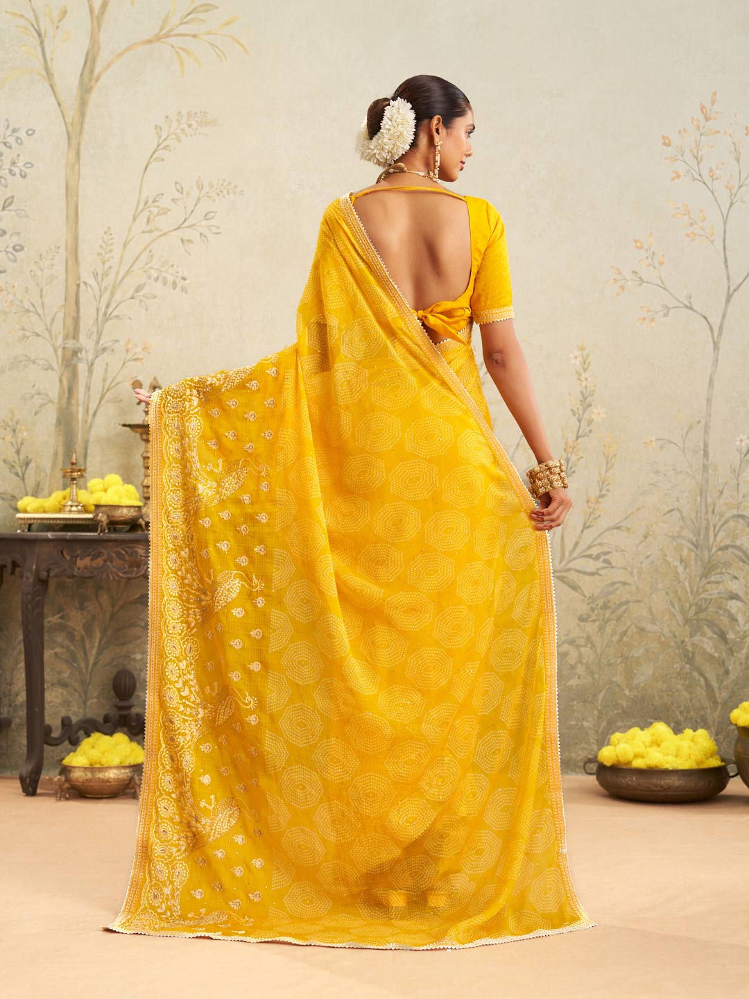 Yellow embroidered chiffon saree party wear