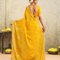 Yellow embroidered chiffon saree party wear