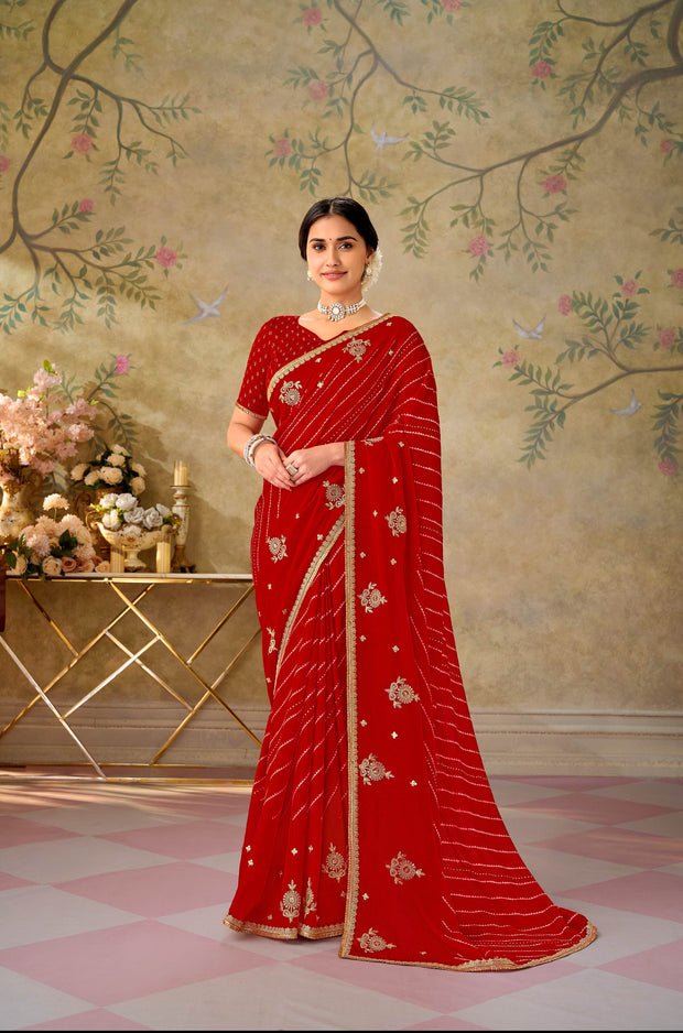 Red embroidered chiffon saree festive wear