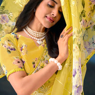 Yellow floral embroidered tissue organza saree festive wear