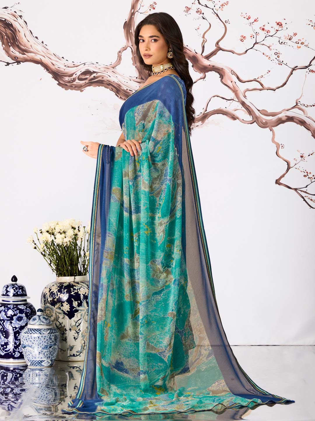 Blue abstract printed georgette saree casual wear