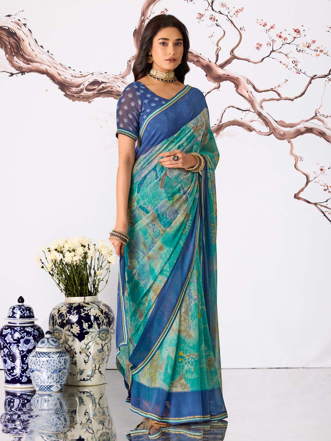 Blue abstract printed georgette saree party wear