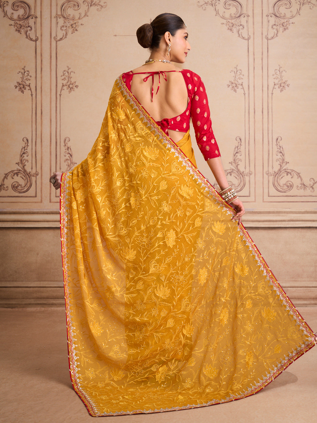 Orange floral embroidered chiffon saree festive wear