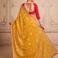 Orange floral embroidered chiffon saree festive wear
