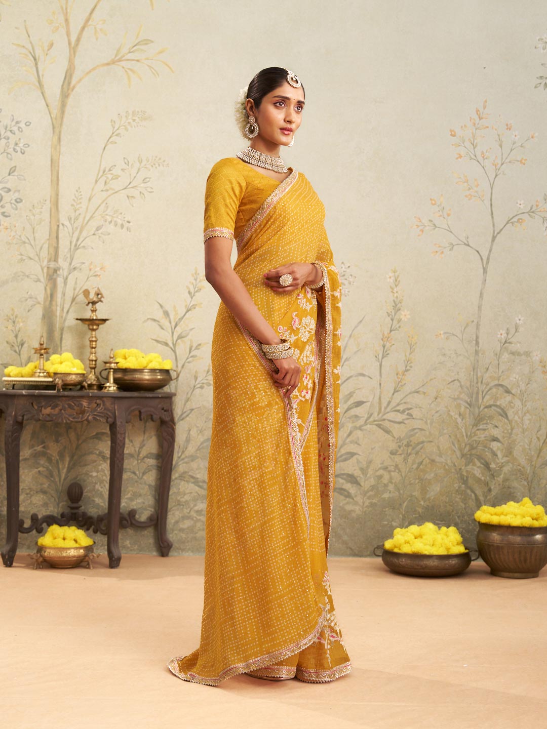 Yellow embroidered chiffon saree casual wear
