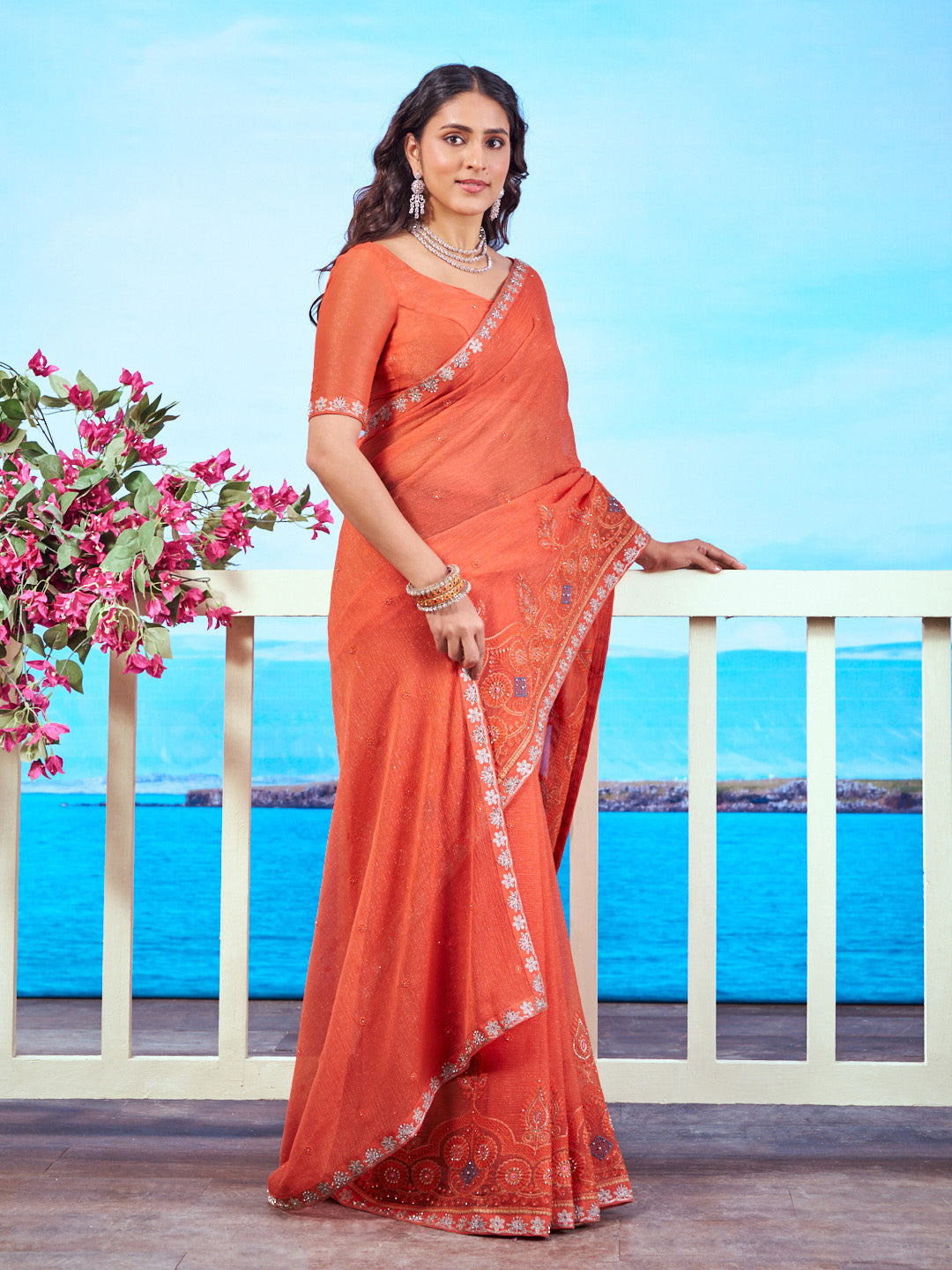 Orange embellished chiffon saree work wear 