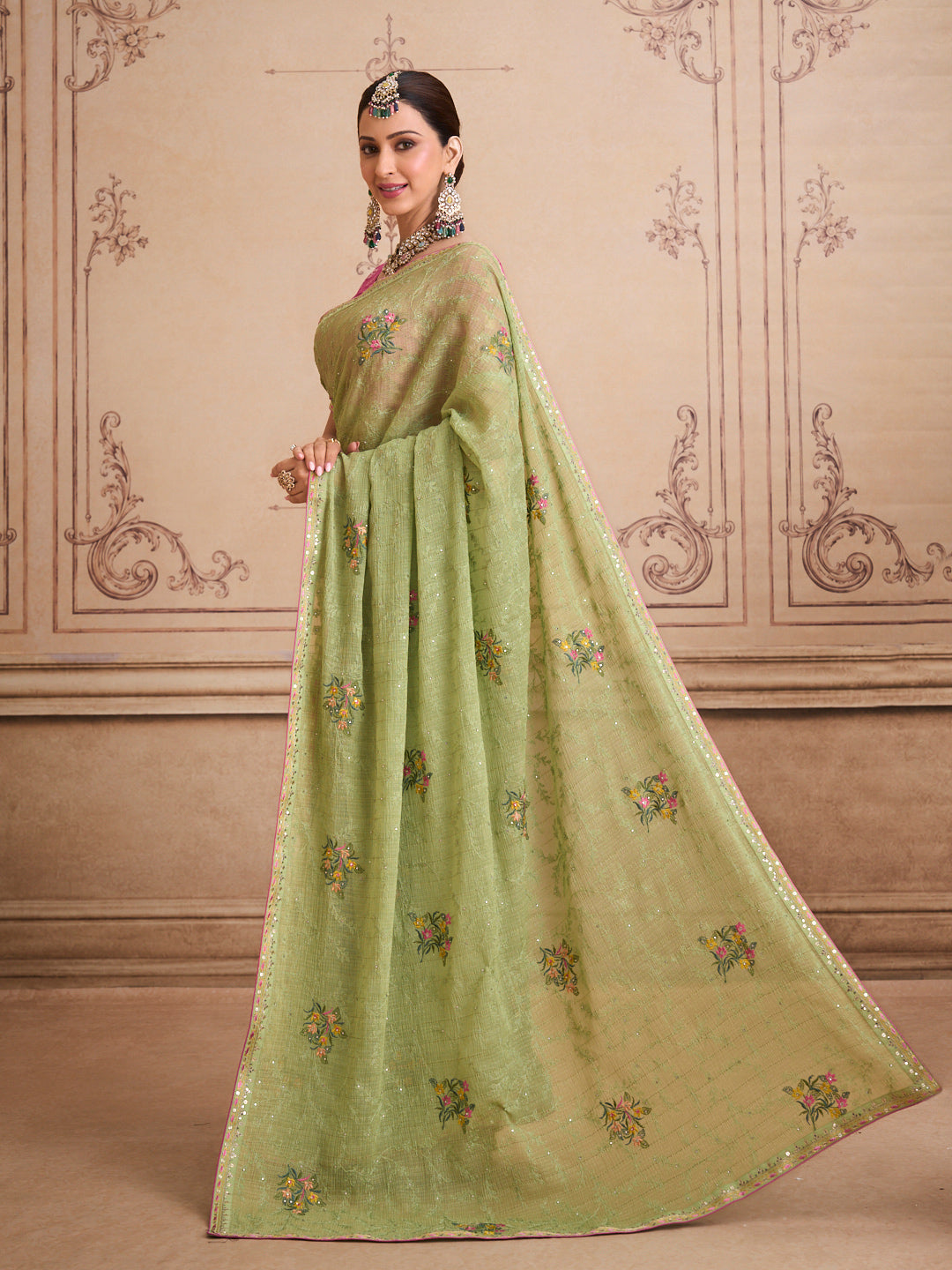 Green embroidered chiffon saree festive wear