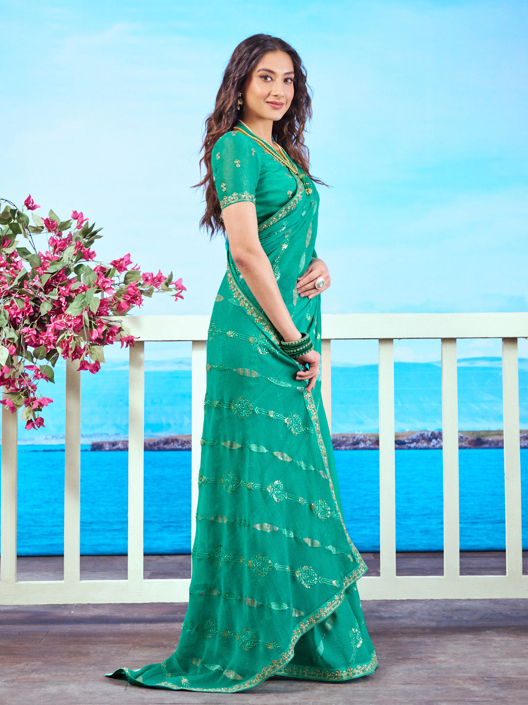 Green embroidered chiffon saree occasion wear