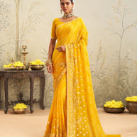 Yellow embroidered chiffon saree daily wear