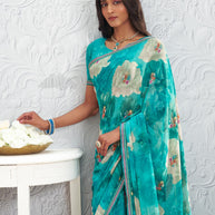 Blue floral printed georgette saree wedding wear