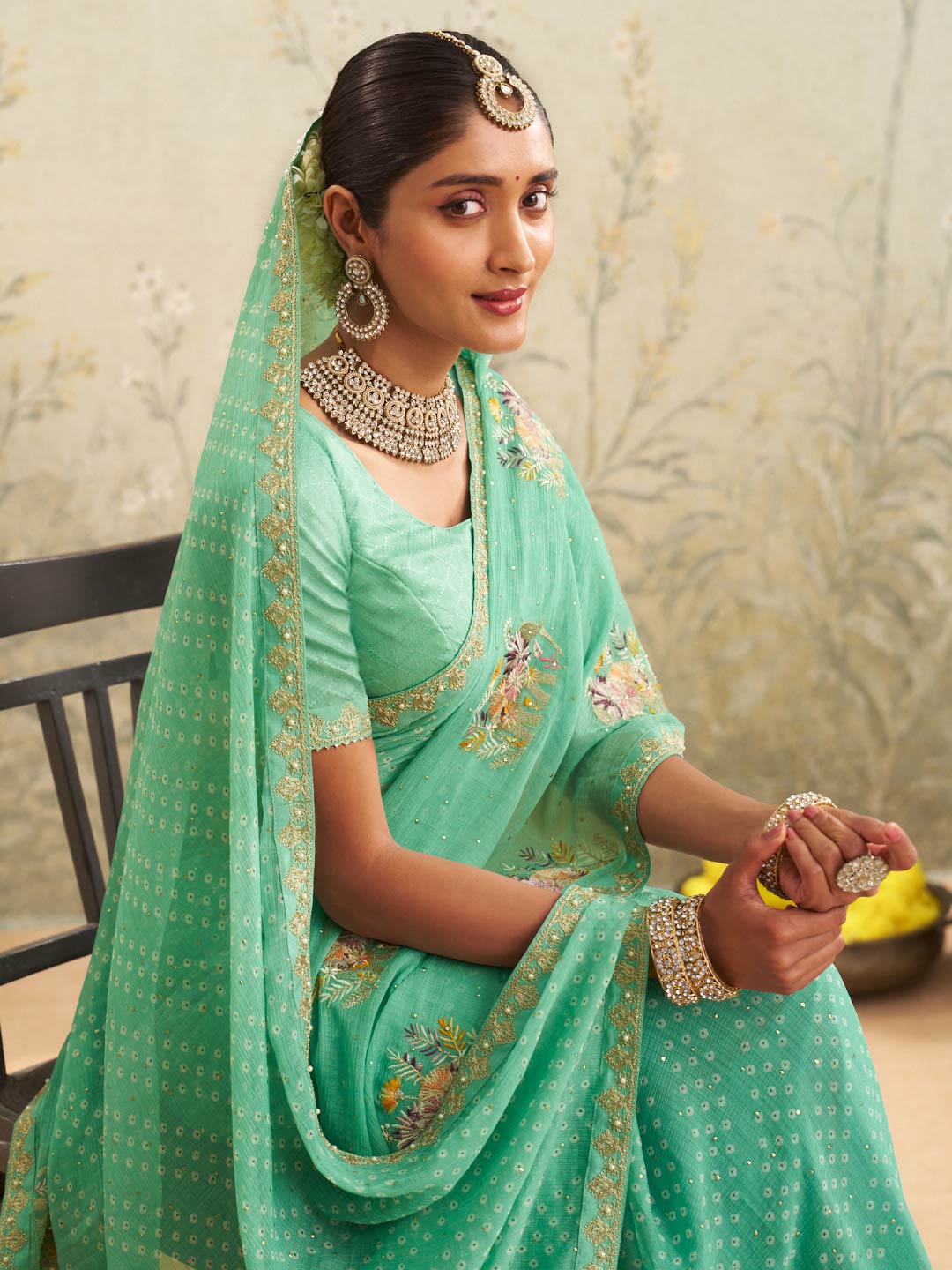 Green embroidered chiffon saree casual wear
