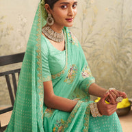 Green embroidered chiffon saree casual wear