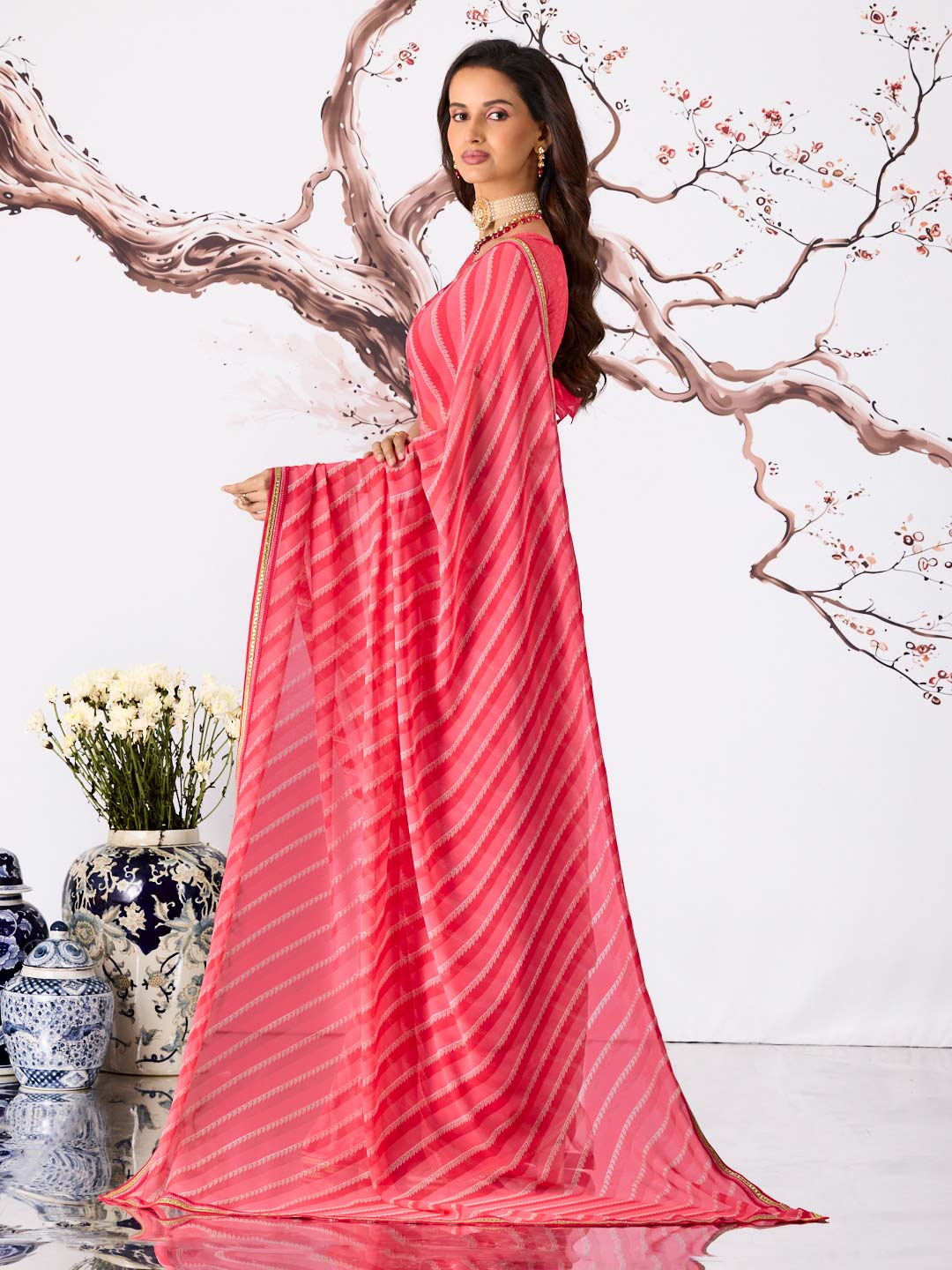 Pink striped georgette saree festive wear