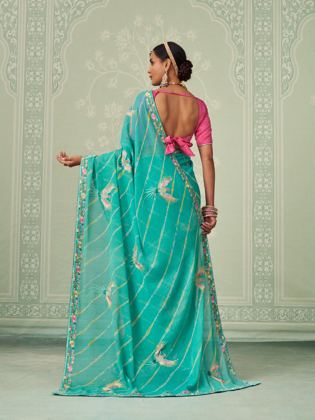Green embroidered chiffon saree festive wear
