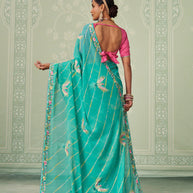 Green embroidered chiffon saree festive wear