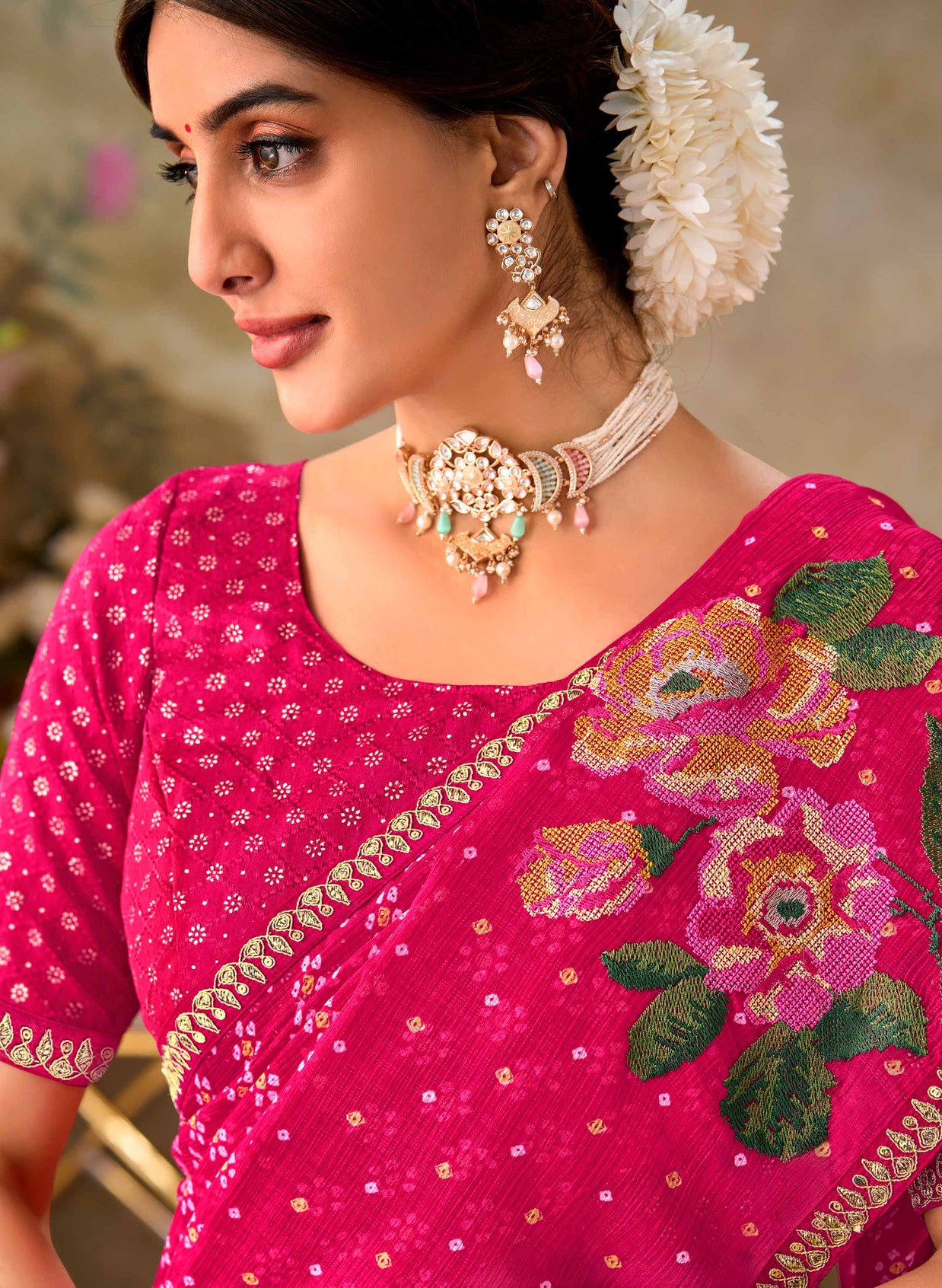Pink embroidered chiffon saree casual wear