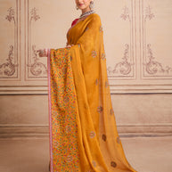 Orange floral embroidered chiffon saree daily wear