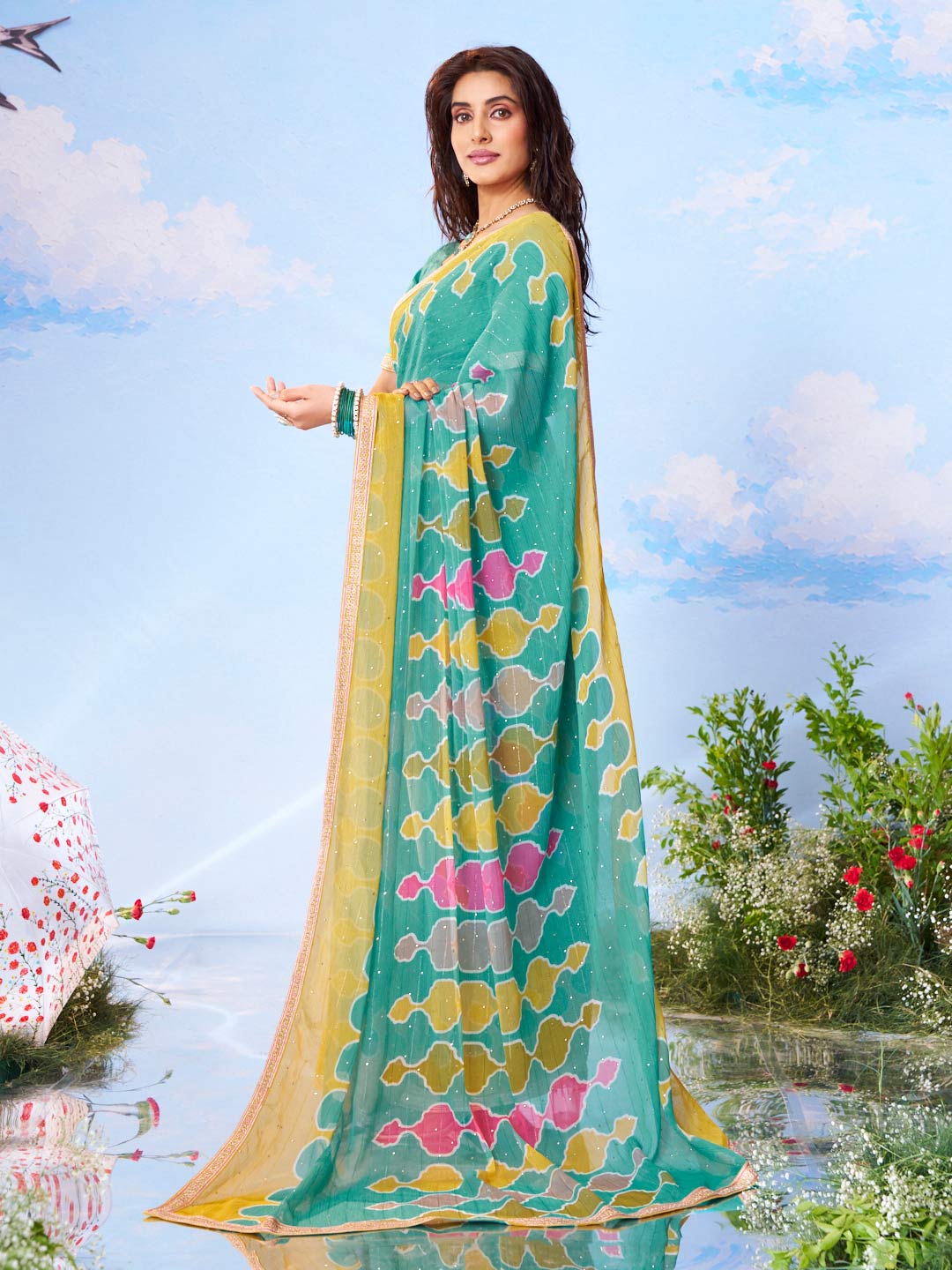 Green embroidered chiffon saree festive wear