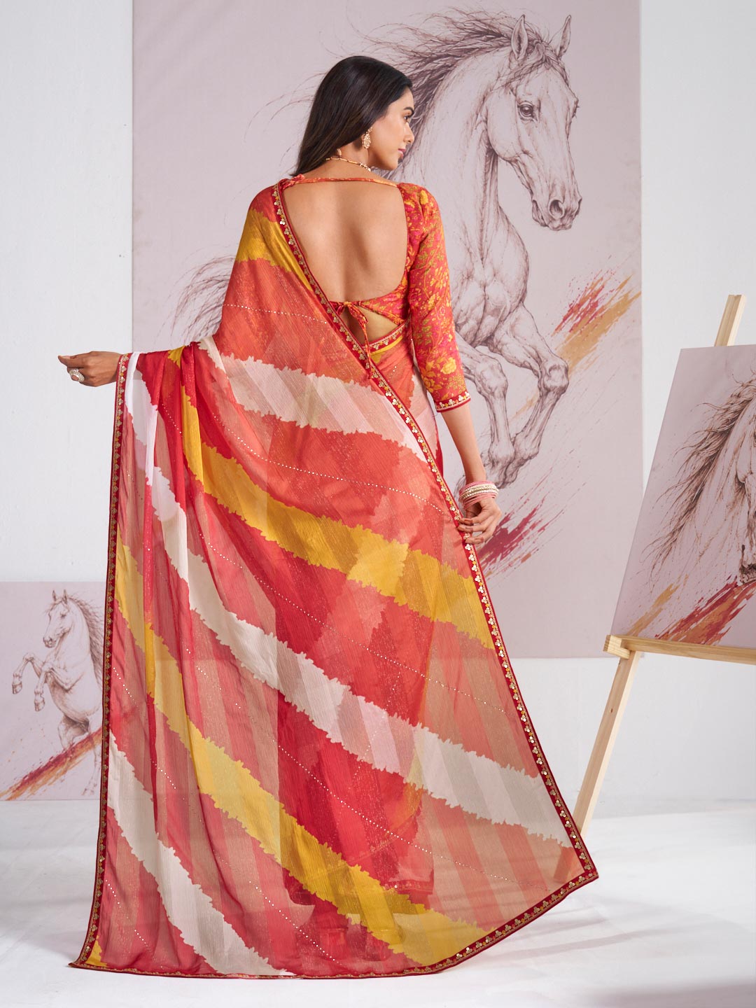 Laxmipati Murli Orange Chiffon Abstract Saree