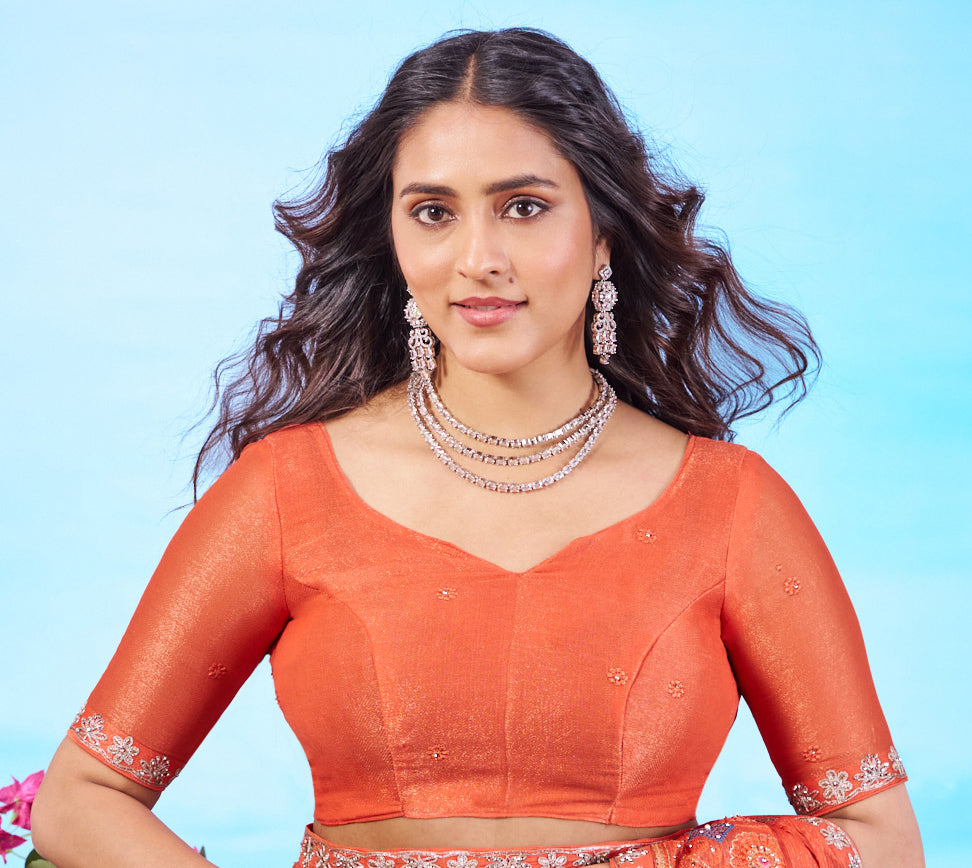 Orange silver embroidered chiffon saree occasion wear