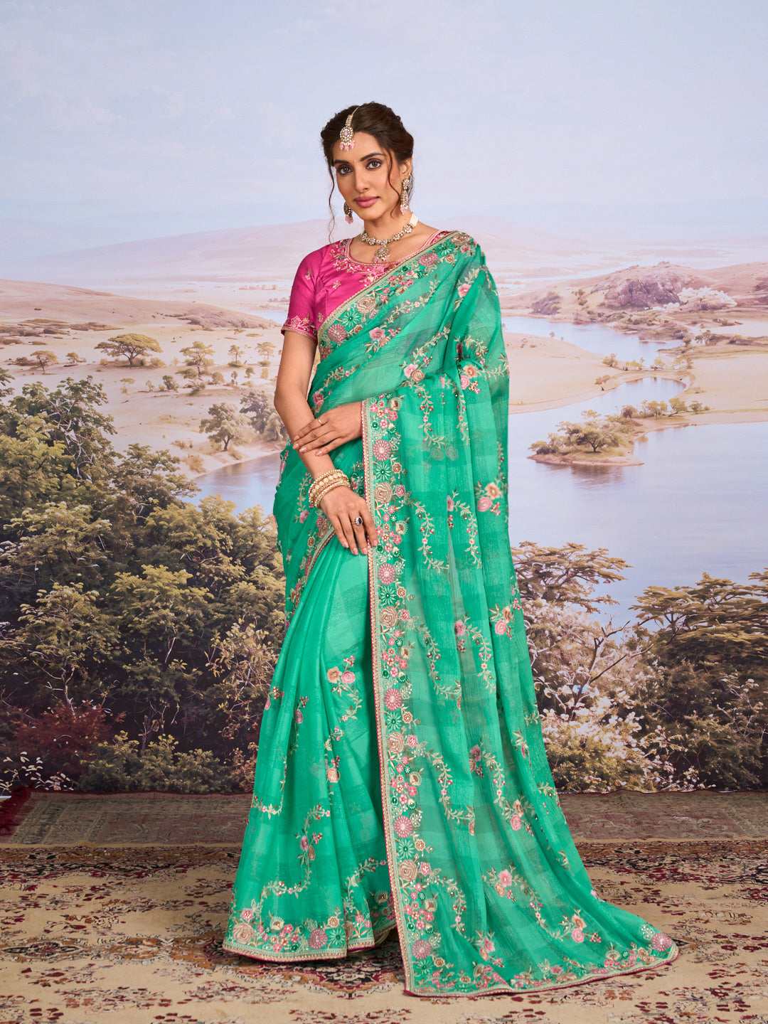Green floral embroidered chiffon saree festive wear