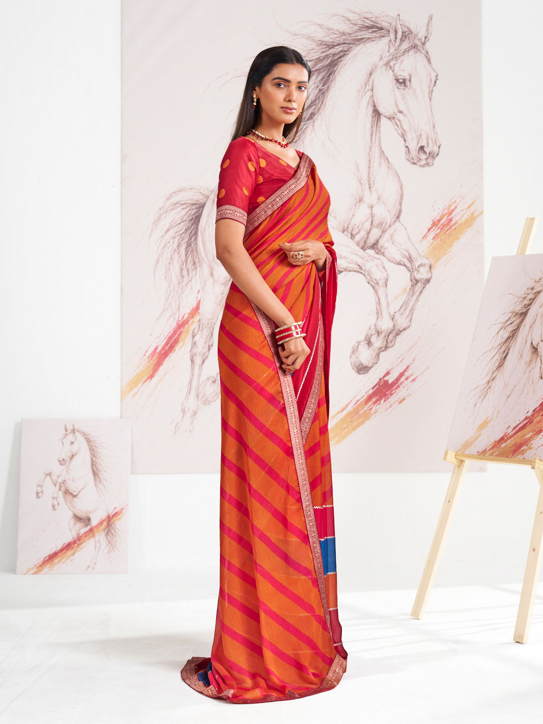 Laxmipati Murli Orange Silk Blend Geometric Saree