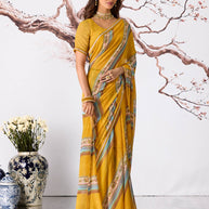 Yellow floral striped printed georgette saree festive wear