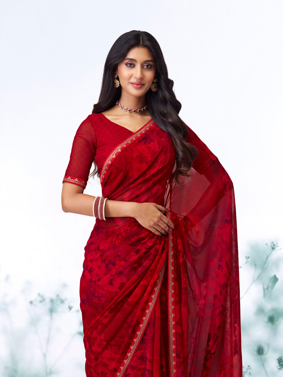 Red abstract printed georgette saree wedding wear