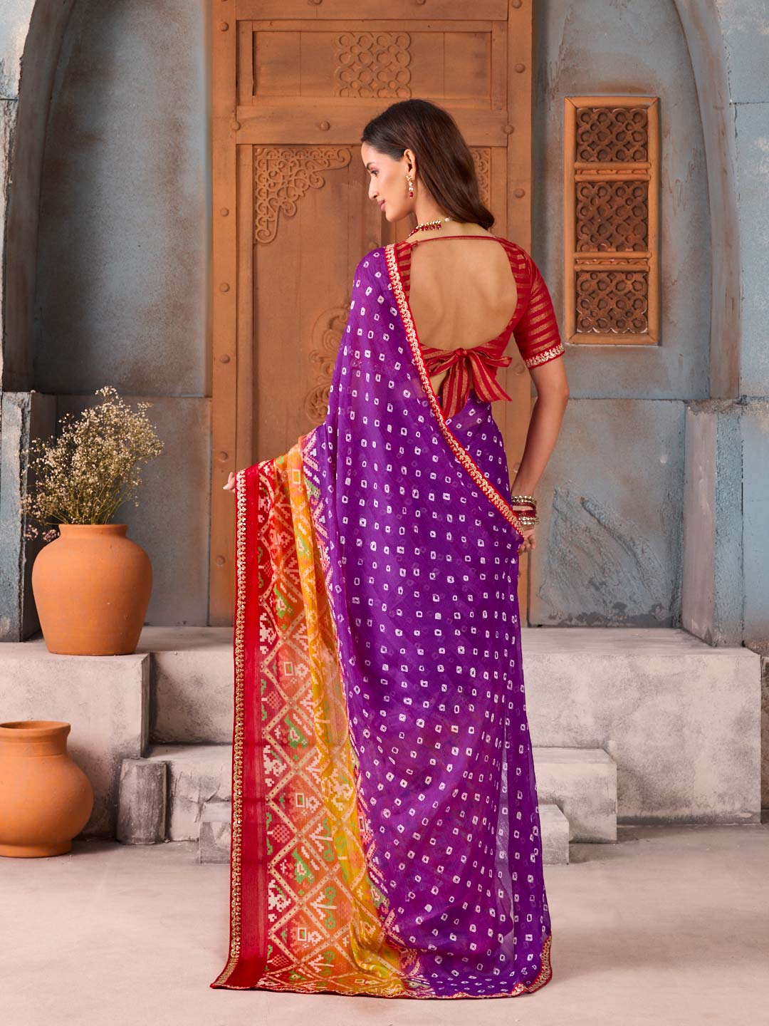 Purple bandhani printed silk blend saree festive wear